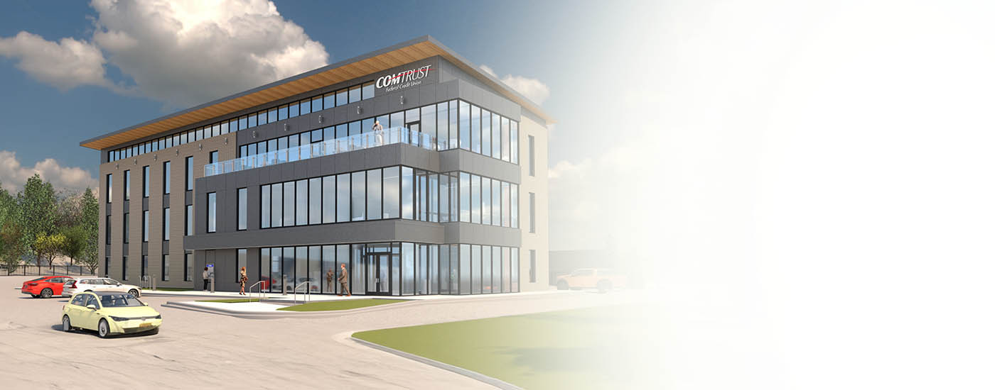 Group of friends at coffee shop viewing features of their COMTRUST Free Checking.